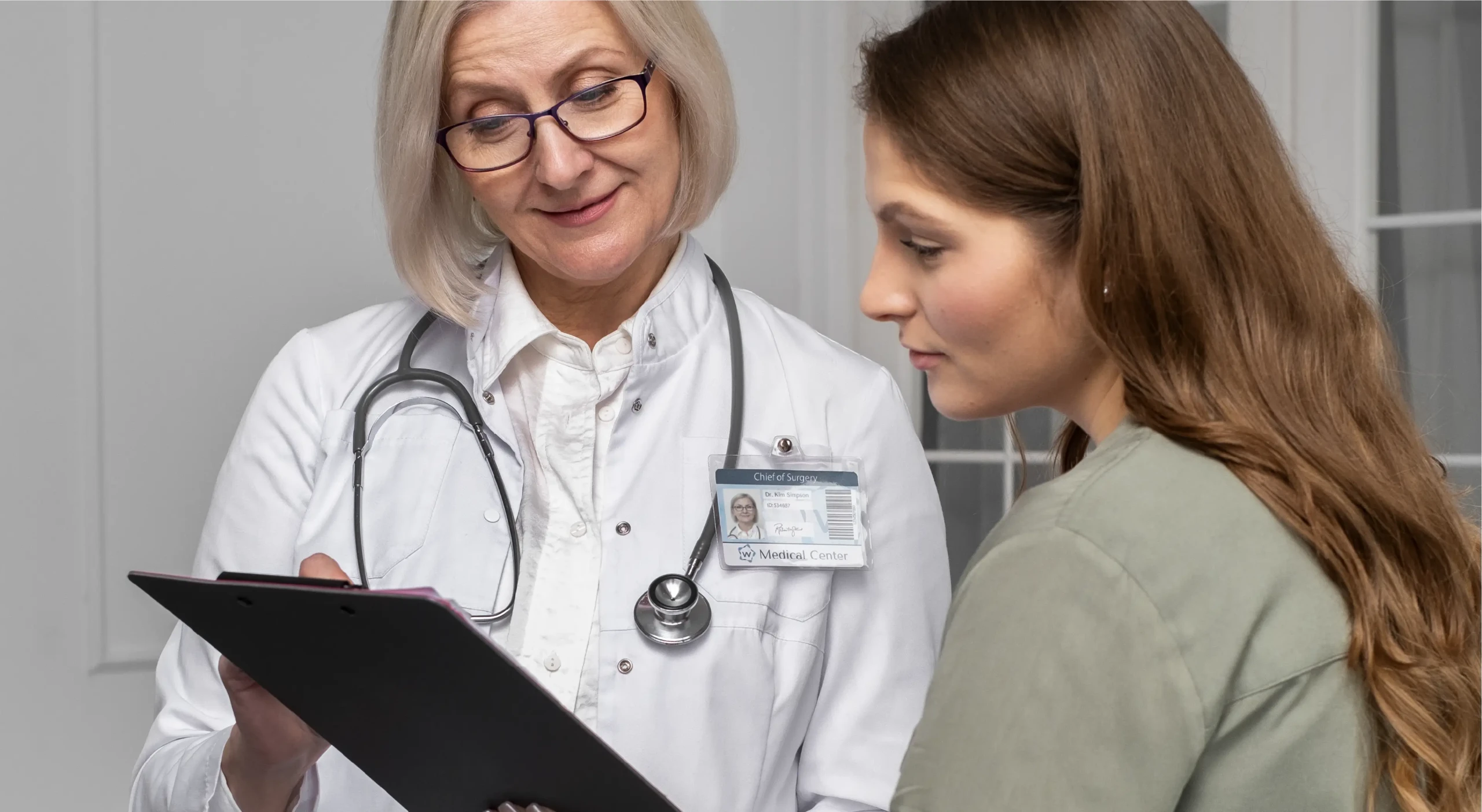 Primary Care Docotr with a patient